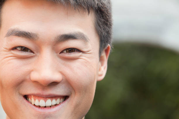 istock Chinese man smiling close up 1083464962