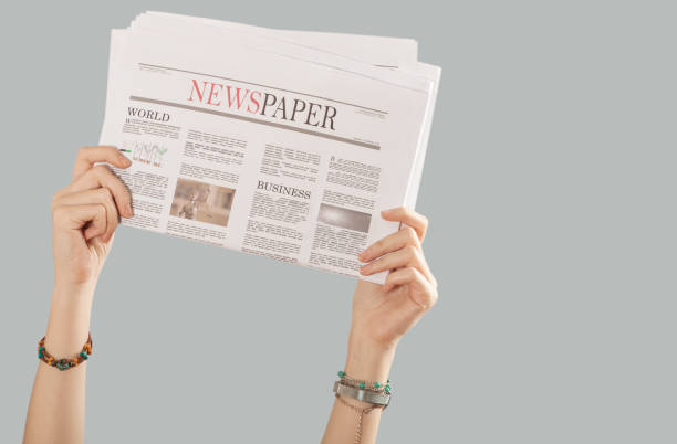 istock woman hands holding papers 1083467702