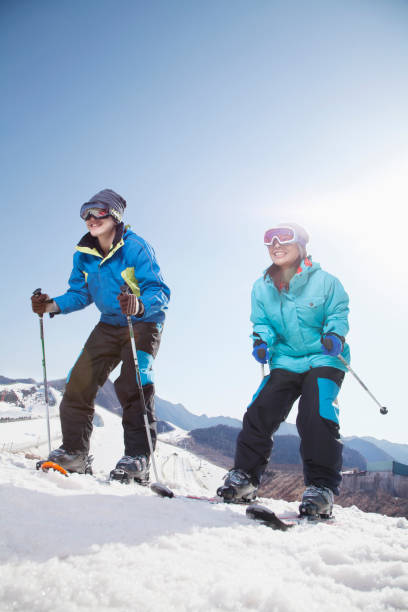 istock Chinese skiers on ski slope 1083472272