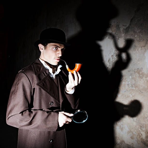 istock A man dressed as Sherlock Homes, with moody lighting 108347230