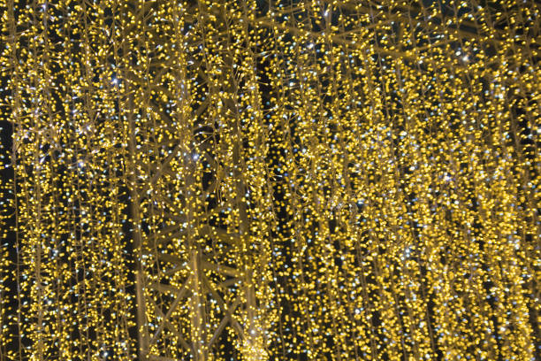 istock Bright Christmas lights on a dark sky background. Backgrounds 1083472336