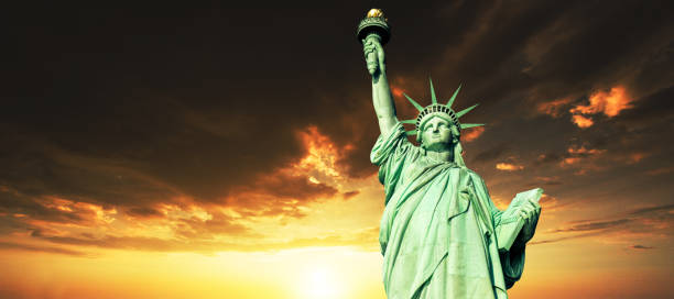 istock statue of libety at dusk 1083472810