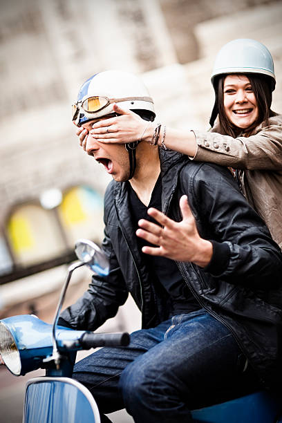 istock Happy couple having fun on scooter 108347455