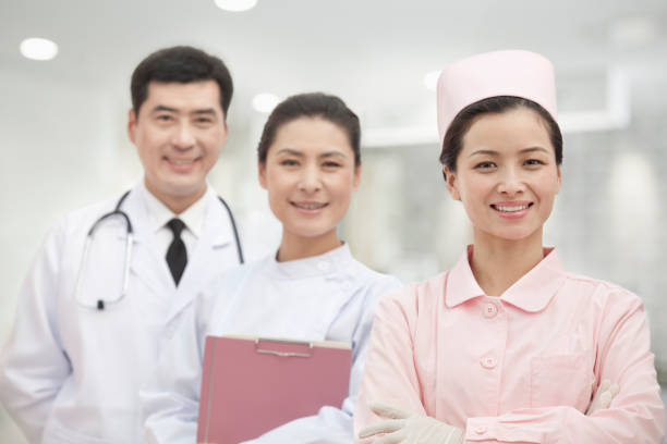 istock Smiling Chinese doctor and nurses 1083478866