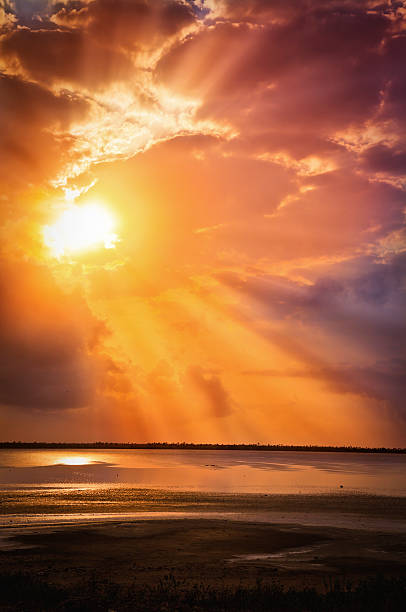 istock Mystical sun rays from a cloudy morning sky 108348058