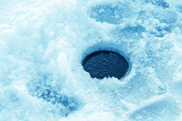 Ice Fishing Hole stock photo
