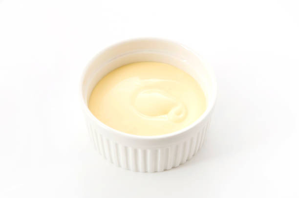 istock Mayonnaise in cocotte isolated on white background 1083481652