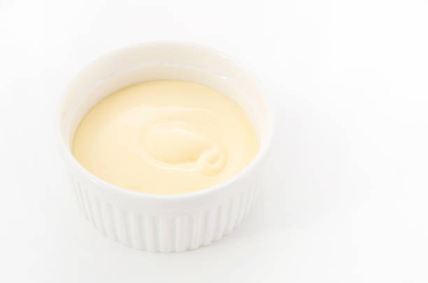 istock Mayonnaise in cocotte isolated on white background 1083481662
