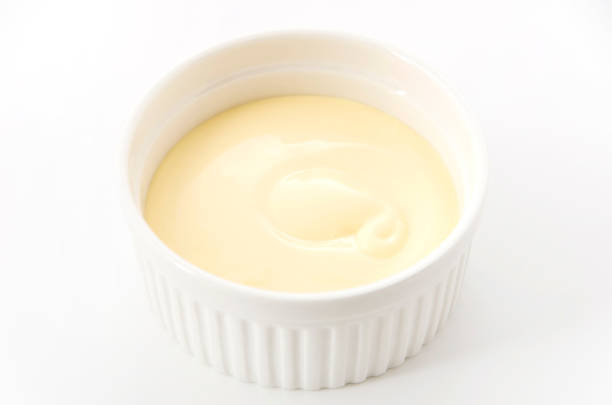 istock Mayonnaise in cocotte isolated on white background 1083481692