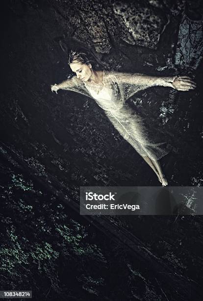 Arisen Stock Photo - Download Image Now - Women, One Woman Only, Floating On Water