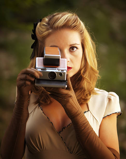 istock vintage woman photographer 108348276