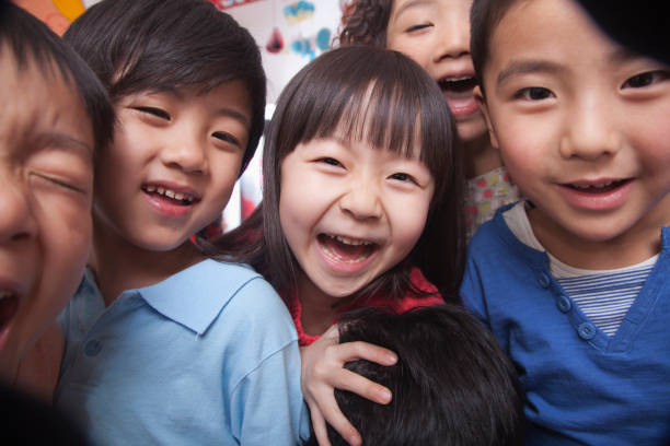 Smiling Chinese kids stock photo