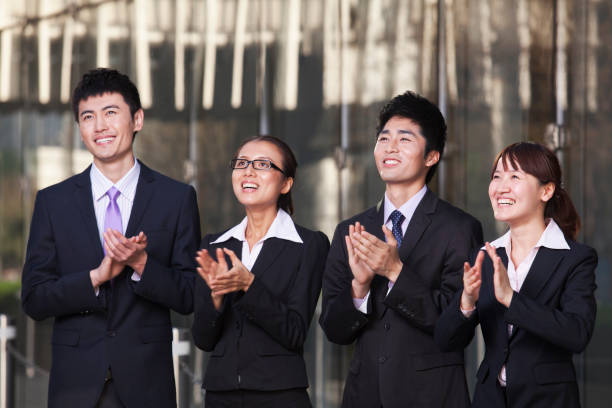 istock Chinese business people clapping 1083483430