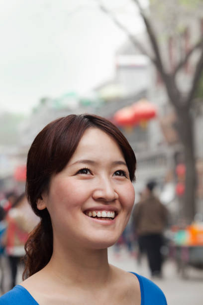 istock Laughing Chinese tourist 1083483570