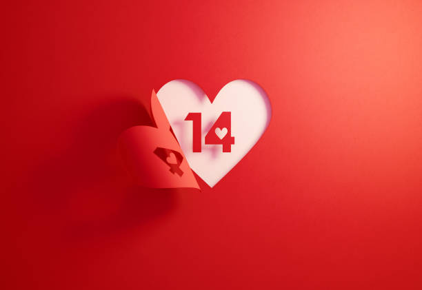 Valentine's Day Concept- Number 14 Inside Of A Red Folding Heart Shape On White Background