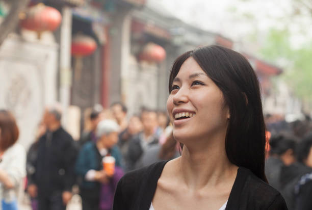 istock Laughing Chinese tourist 1083484770