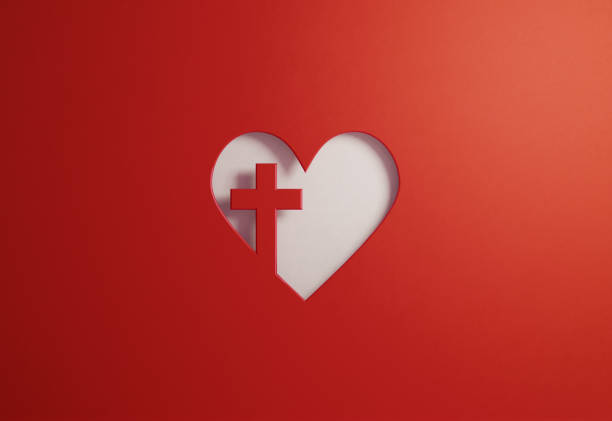 Cut Out Heart Shape With A Cross On Red Background - Good Friday And Faith Concept Cut out heart shape with a cross on red background. Great use for Good Friday and faith concepts. Horizontal composition with copy space. cross shape cross religion christianity stock pictures, royalty-free photos & images