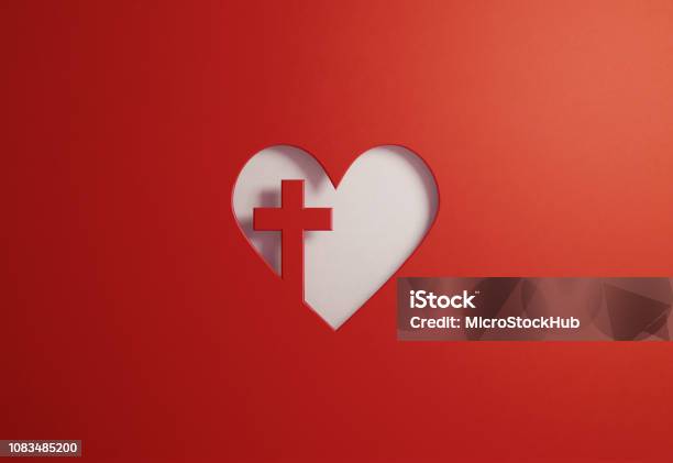 Cut Out Heart Shape With A Cross On Red Background Good Friday And Faith Concept Stock Photo - Download Image Now