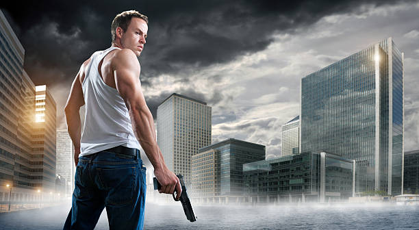 istock man with gun in city 108348559