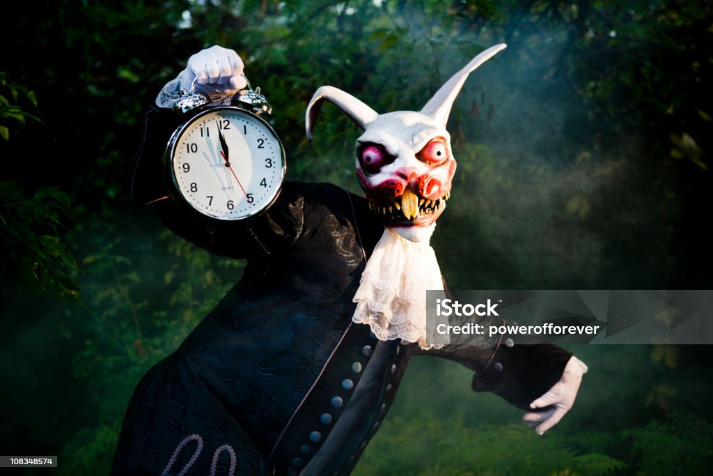 The White Rabbit You're Late! You're Late! Creepy Fairy Tale White Rabbit reminding you about the time. Rabbit - Animal Stock Photo