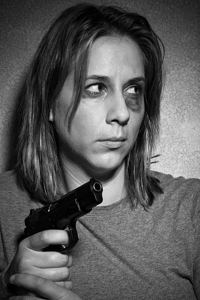 Breaking point: Abused woman protecting herself with a gun