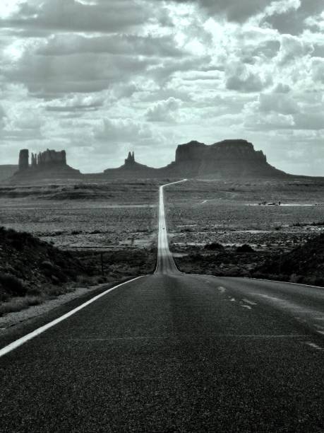 istock Road to Monument Valley in black and White 1083490218