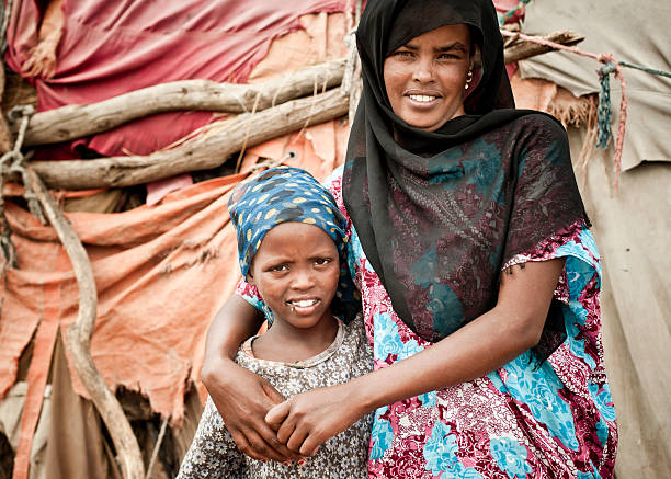Somali Mother and Daughter  poverty child ethnic indigenous culture stock pictures, royalty-free photos & images