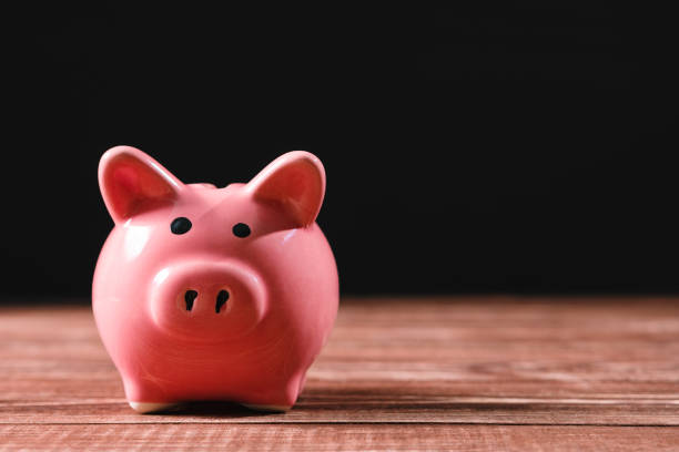 istock piggy bank. copy space. 1083498438