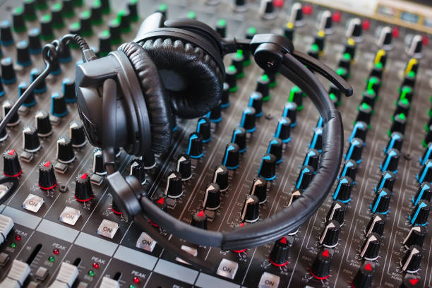 istock sound mixer and headphones. recording studio. 1083498496