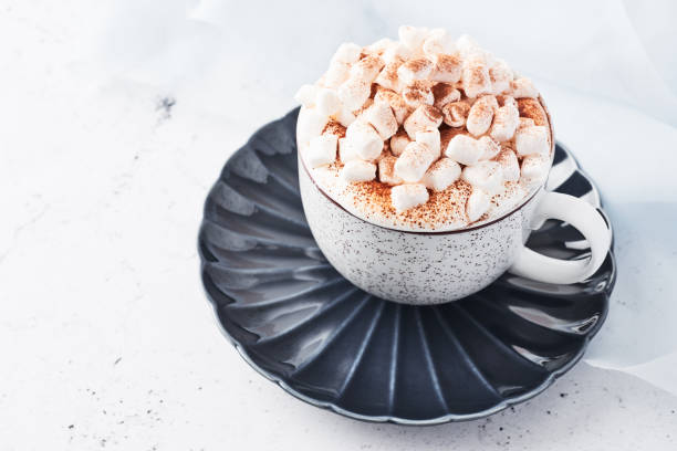 istock Hot chocolate or cocoa with whipped cream and marshmallow candy 1083499966