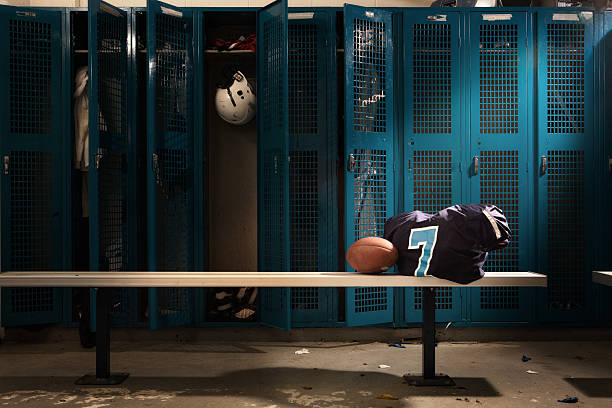 Football Locker room Messy football locker room. bench stock pictures, royalty-free photos & images