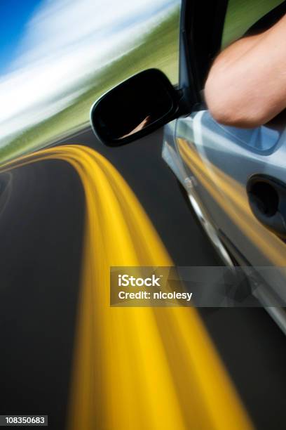 Driving A Car Stock Photo - Download Image Now - Adult, Adults Only, Blurred Motion