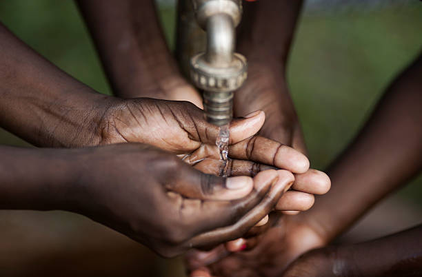 istock Hands of children with water 108350721