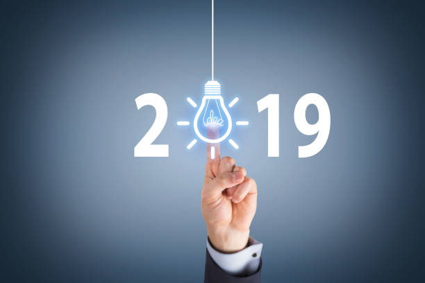 istock Human Hand Touching New Year 2019 Idea Concepts 1083507228