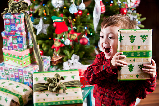 a happy young boy / figuring out what he's got / inside the wrapping

 [url=file_closeup.php?id=14176003][img]file_thumbview_approve.php?size=1&id=14176003[/img][/url]

[url=http://www.istockphoto.com/file_search.php?action=file&lightboxID=537170][IMG]http://i130.photobucket.com/albums/p259/RonTech2000/lightbox-christmas_zps20f936cc.jpg[/IMG][/url]

[url=http://www.istockphoto.com/file_search.php?action=file&lightboxID=531126] [IMG]http://i130.photobucket.com/albums/p259/RonTech2000/lb-children.jpg[/IMG][/url]

Children age 2 and up. For baby and toddler photos see [url=http://www.istockphoto.com/file_search.php?action=file&lightboxID=232200]Baby Lightbox[/url]