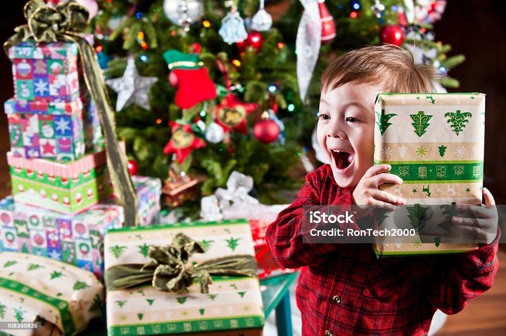 Boy holding gift to ear in front of Christmas tree and gifts a happy young boy / figuring out what he's got / inside the wrapping

 [url=file_closeup.php?id=14176003][img]file_thumbview_approve.php?size=1&id=14176003[/img][/url]

[url=http://www.istockphoto.com/file_search.php?action=file&lightboxID=537170][IMG]http://i130.photobucket.com/albums/p259/RonTech2000/lightbox-christmas_zps20f936cc.jpg[/IMG][/url]

[url=http://www.istockphoto.com/file_search.php?action=file&lightboxID=531126] [IMG]http://i130.photobucket.com/albums/p259/RonTech2000/lb-children.jpg[/IMG][/url]

Children age 2 and up. For baby and toddler photos see [url=http://www.istockphoto.com/file_search.php?action=file&lightboxID=232200]Baby Lightbox[/url] Child Stock Photo