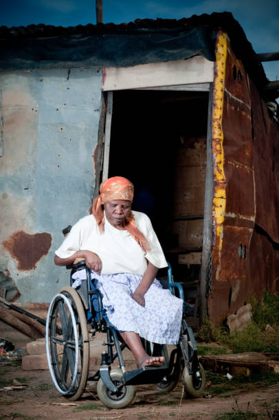 Cтоковое фото Народа коса женщина в инвалидной коляске