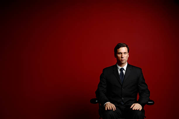Dark skin manager guy enjoy working, process wear specs white shirt isolated red background