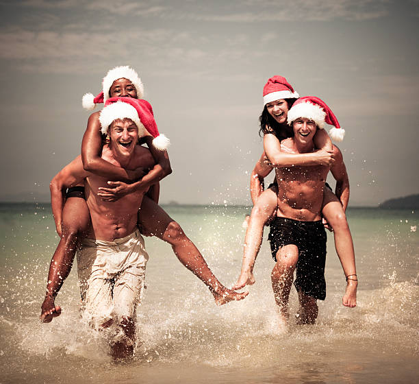 istock Young People  on the beach at Christmas 108351530