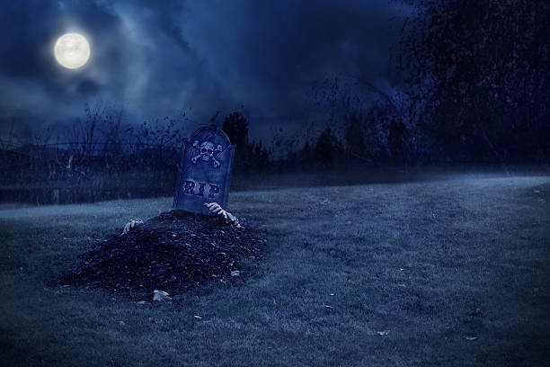 Zombie Rising From Grave stock photo