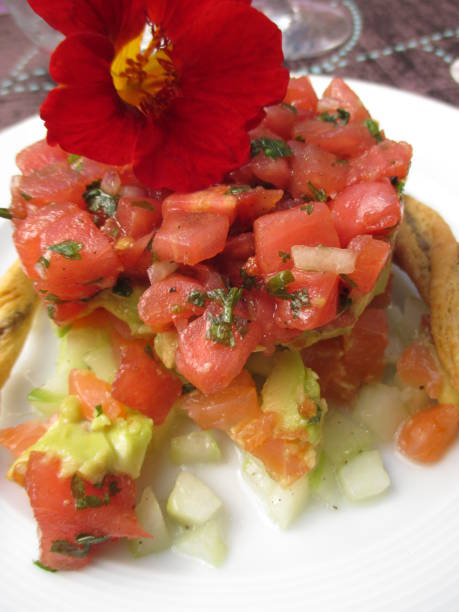istock Edible flower on a marinated salmon and avocado timbale 1083520702