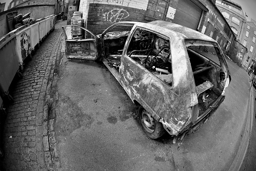 Grunge burnt car in the street - Black and white\n\n[url=http://www.istockphoto.com/search/lightbox/11929316][img]http://bit.ly/1DjClh1[/img][/url]\n\n.\n\n[url=http://www.istockphoto.com/portfolio/ilbusca][img]http://bit.ly/1IdpaRP[/img][/url]