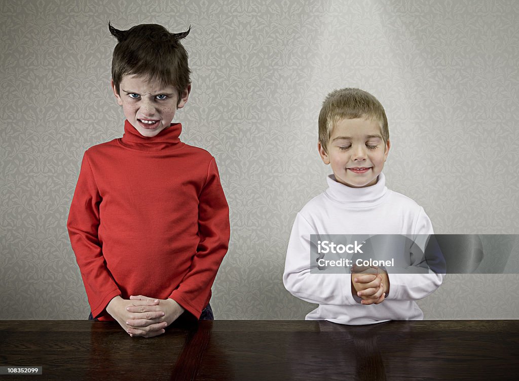 Sibling Personalities  Hands Clasped Stock Photo