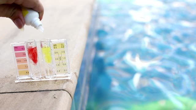 PH Test Kit on swim pool river water inspector