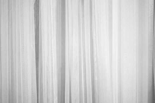 White curtain fabric pattern surface texture. Close-up of interior material for design decoration background