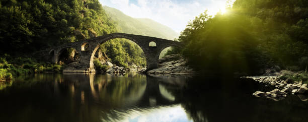 Stone bridge in Italy. A very old devil's bridge with magic tricks at the very forefront.