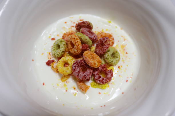 istock white yogurt and colorful cereals 1083531546