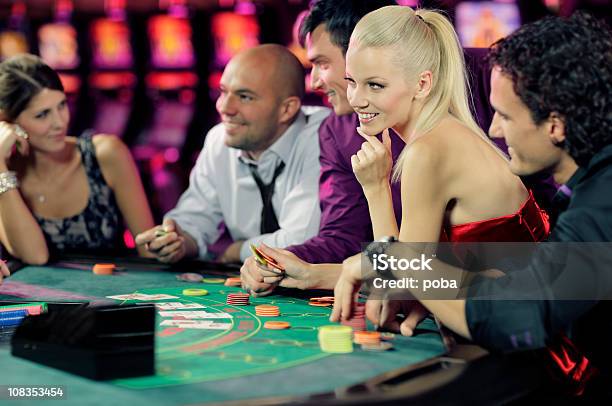 Guys And Girls Playing Black Jack In Casino Stock Photo - Download Image Now - Blackjack, Adult, Casino