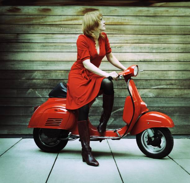 istock Young Woman on Red Vintage Retro Scooter 108353961