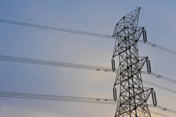 istock Electricity concept. Close up high voltage power lines station. 1083539982